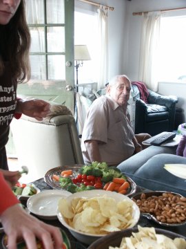 Bapa, Steph's grandfather, keeping an eye on the food